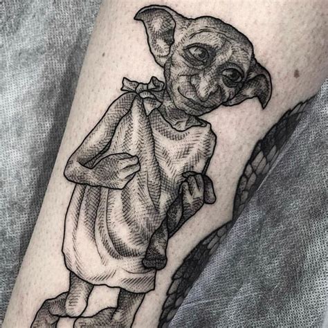 Dobby by Australia artist @eddylou #hogwartstattoo #literaryink ...