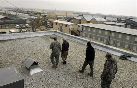 File:Gates tours Bagram Air Base rooftop.jpg