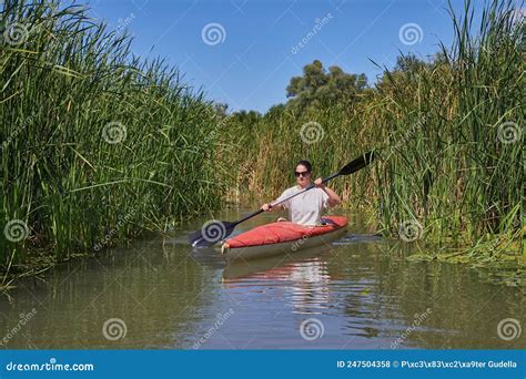 Kayaking on the River stock photo. Image of lake, kayak - 247504358