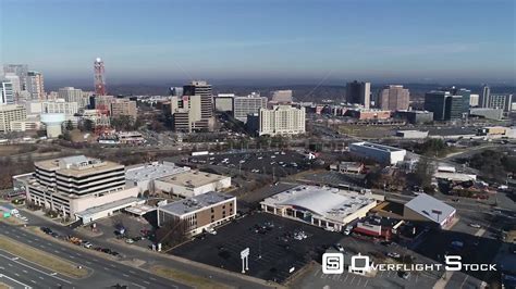 OverflightStock™ | Tysons, Virginia, USA. Pan from left to right from Tysons Corner skyline to ...