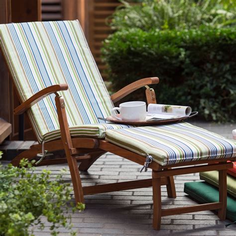 a chair with a cup and plate on it