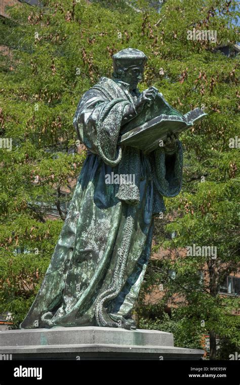 Rotterdam, Holland - July 30, 2019: Bronze statue of the Dutch Renaissance humanist Erasmus of ...