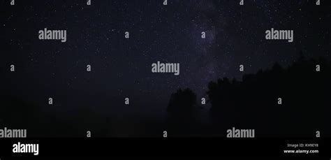 Night sky over rural landscape. Beautiful night starry sky Stock Photo - Alamy