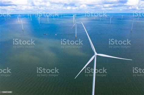 Aerial View Enormous Windmills Stand In The Sea Along A Dutch Sea ...