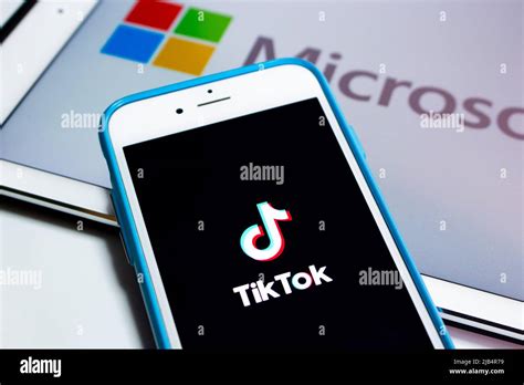 Kumamoto, Japan - Aug 3 2020 : TikTok & Microsoft logos on iPhone and iPad. TikTok and Bytedance ...