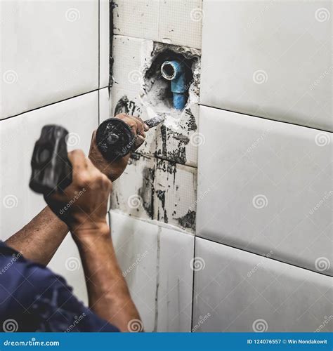 Plumber repair water pipe stock image. Image of wall - 124076557