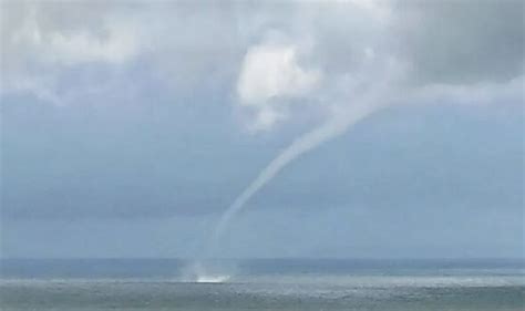 Moment rare 'sea tornado' forms off the coast as locals left terrified | UK | News | Express.co.uk