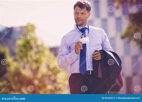 Businessman Showing Identity Card Badge Stock Image - Image of holding, dressed: 84444217