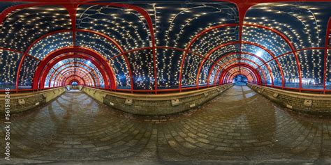 spherical night 360 panorama in festively lit underground passage ...