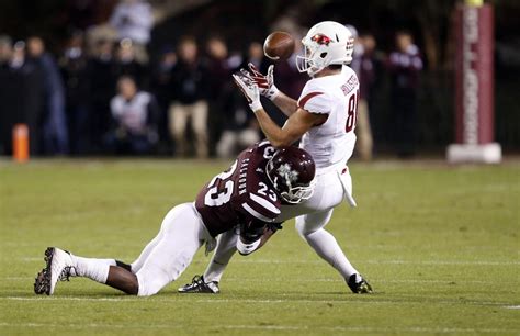 Twins Jacob and Cody Hollister find niches at Wyoming, Arkansas | Football | trib.com