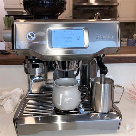 Breville Oracle Touch vs Delonghi Eletta: 7 Key Differences