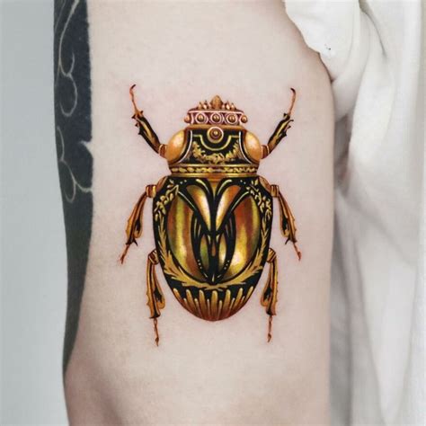 Tattoo Artist Creates Stunning Gold Tattoos