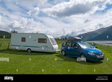 Caravan and car on a small caravan site at Onich, Lochaber, Highland, Scotland, UK Stock Photo ...