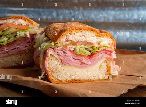 Italian sub sandwich with provolone cheese ham prosciuttini cappacuolo salami and pepperoni ...