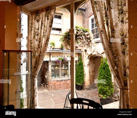 Beatrix Potter shop in Gloucester near the cathedral Stock Photo - Alamy