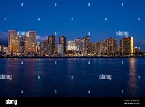 Night view of Honolulu skyline at blue hour, Oahu, Hawaii Stock Photo - Alamy