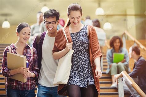 College students walking - Stock Image - F018/4940 - Science Photo Library