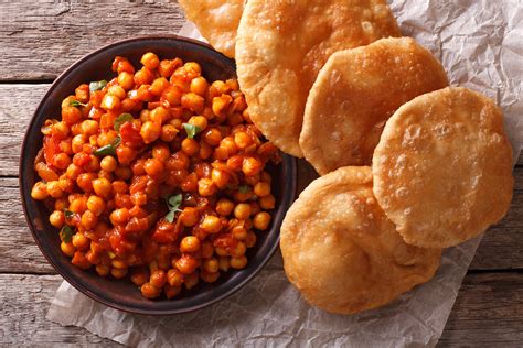 Delicious Indian Chana masala and puri close-up. Horizontal – Spice Affair Indian Cuisine