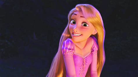 Download Smiling Disney Princess Rapunzel Wallpaper | Wallpapers.com