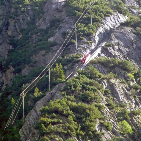 Ride the Gelmerbahn funicular in Handegg to a trail around Gelmersee ...