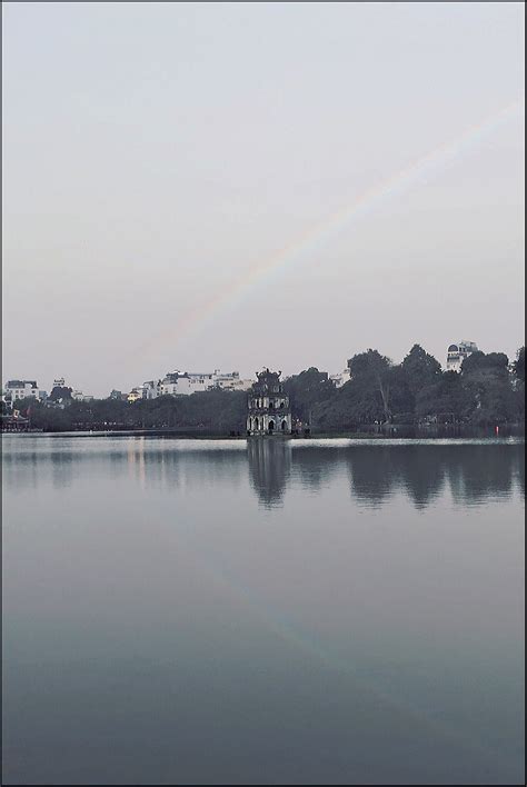 Night view of rainbow and turtle tower on Behance