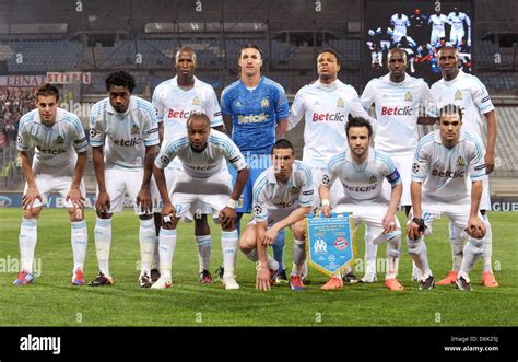 The squad of players of French soccer club Olympique Marseille pose for ...