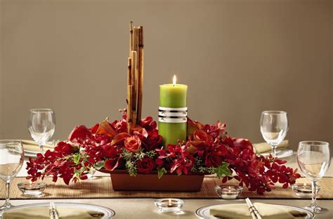 The FTD® Dramatic Garden™ Centerpiece has an alluring elegance that will make your wedding c ...