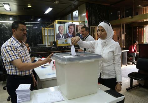 Syrians go to the polls in election that Assad is set to win