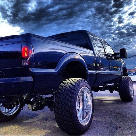 lifted trucks big tires - Violette Swann