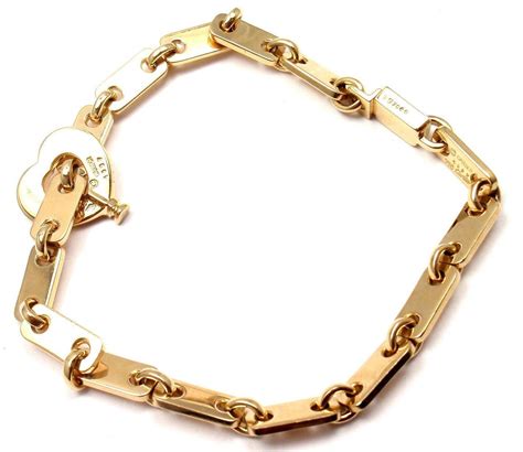 Cartier Gold Heart Lock Charm Link Bracelet at 1stdibs