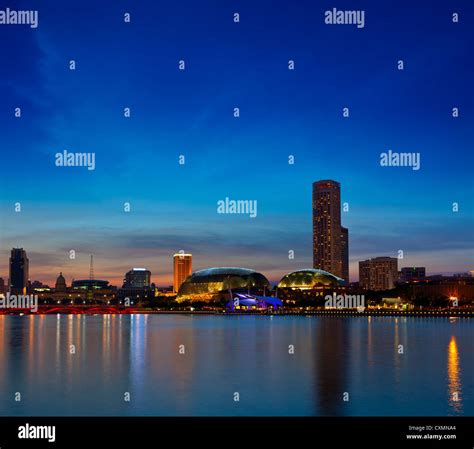 Singapore skyline at Marina Bay in the evening Stock Photo - Alamy