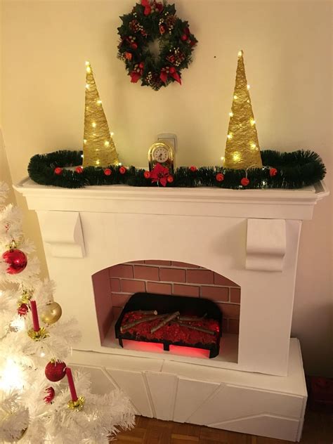 CARDBOARD FIREPLACE My mother made this fireplace from cardboard, expanding foam and christmas ...