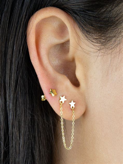 By Adina Eden Double Star Chain Stud Earring | Ear jewelry, Earings piercings, Unique ear piercings