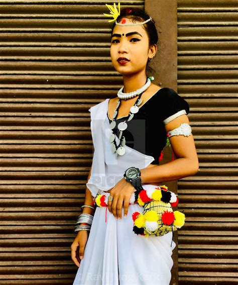 Girls Of The Tharu People In Their Traditional Dress Perform Music And ...