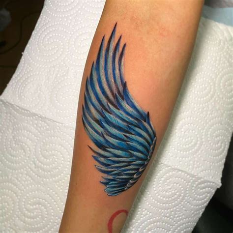 Realistic Blue Wing Tattoo | Wings tattoo, Wing tattoo designs, Angel wings tattoo forearm