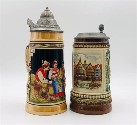 German beer mugs with lids (2) - Pewter/Tin, Ceramic - Catawiki