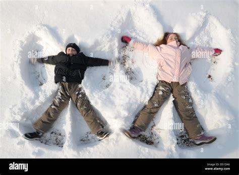 Snow angels children hi-res stock photography and images - Alamy