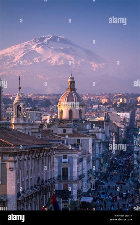 Catania, the city center with Mt. Etna volcano, covered with snow, on the background, Sicily ...