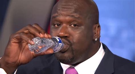 Shaquille O’Neal holding a regular sized water bottle : interestingasfuck