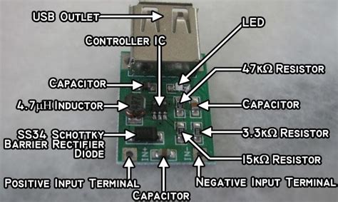 The boost converter used in this experiment with the primary components ...