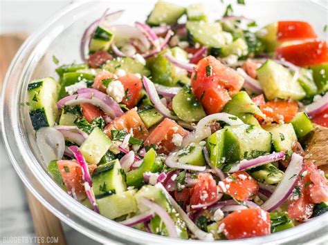 Super Fresh Cucumber Salad is a cold, crunchy, juicy mix of flavorful vegetables topped with a ...