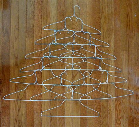 Quirky Wire Hanger Christmas Tree Card Holder | Wire hanger crafts, Hanger christmas tree ...