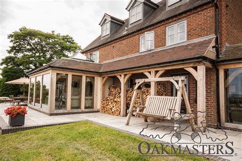 Large oak framed orangery style extension - Oakmasters