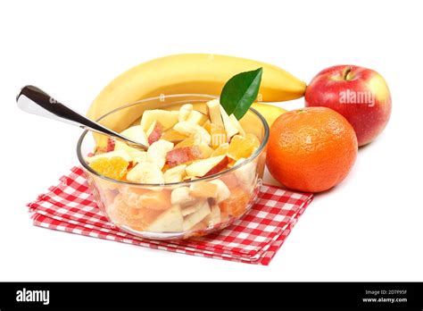 Fresh fruit salad isolated on white background Stock Photo - Alamy