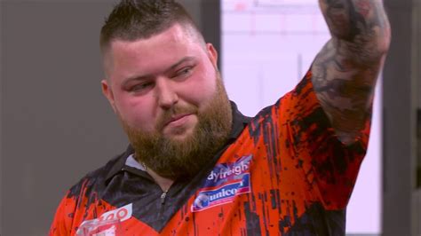 World Darts Championship: Michael Smith shows class to knock out Joe ...