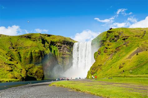 Skógafoss Waterfalls below the Eyjafjöll mountains and west of ...