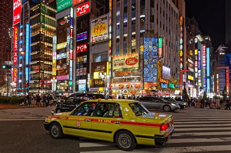 Taxis in Shinjuku at night editorial image. Image of tourism - 149505880