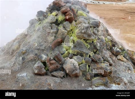 Iceland- sulfur fumarole in the colorful Namaskard high temperature ...