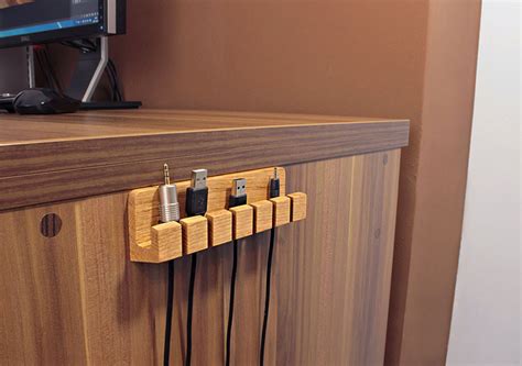 11 Creative Cable Holders That Stop The Cables Falling Off Your Desk | CONTEMPORIST