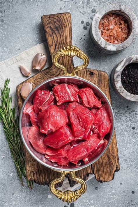 Uncooked Raw Diced Beef Veal Meat for Stew in Skillet. Gray Background Stock Image - Image of ...